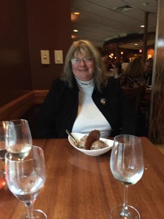 Jocelyn a woman in white turtleneck and black jacket.jpg